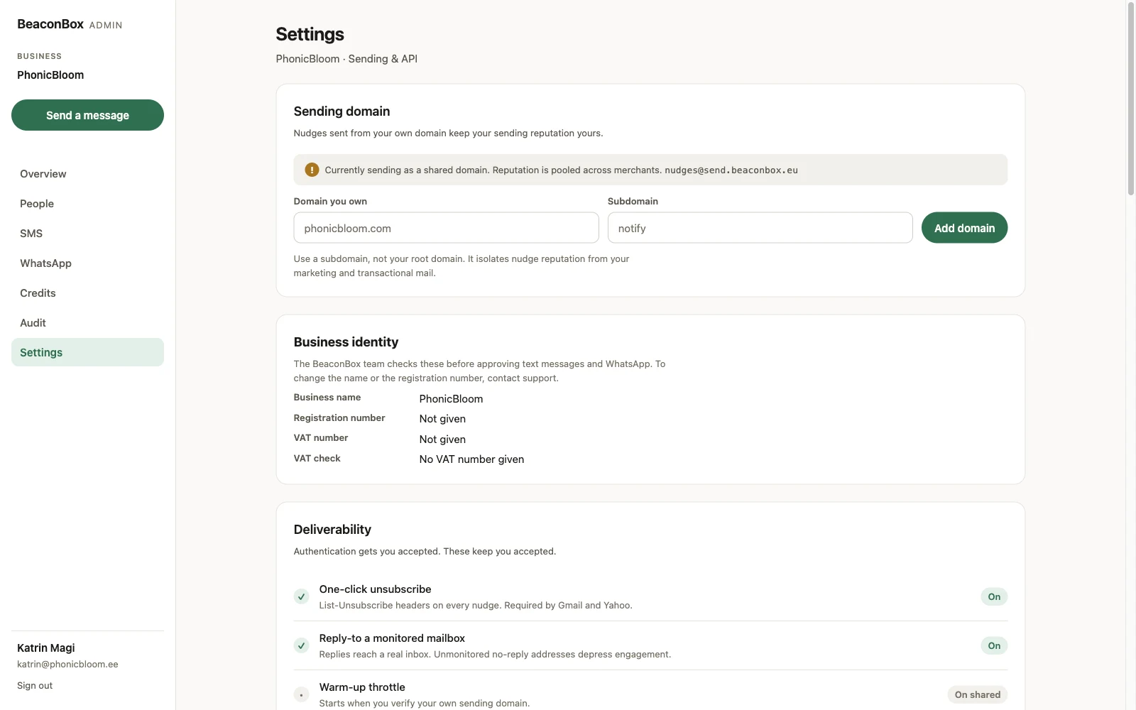 BeaconBox settings: the sending domain panel showing the account is on the shared domain with fields to add one of its own, and the deliverability panel with one-click unsubscribe, monitored reply-to, warm-up, complaint monitoring and suppression, above the live complaint and bounce rates
